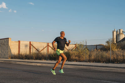 A old man doing sports