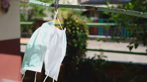 Close-up of clothes drying on clothesline