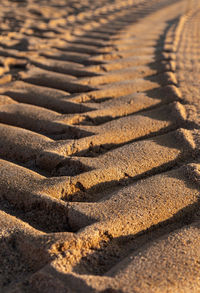 High angle view of shadow on sand