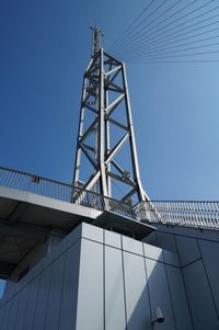 Low angle view of built structure against clear blue sky