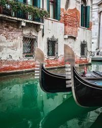 Boats moored in canal