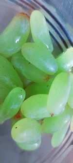 High angle view of wet fruit on table