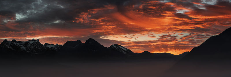 Scenic view of mountains against sky during sunset