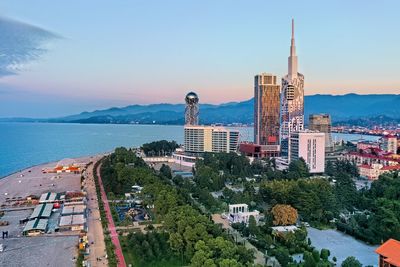 Panoramic view of city buildings against sky