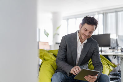 Young man using mobile phone