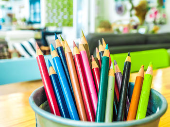 Close-up of colored pencils on table