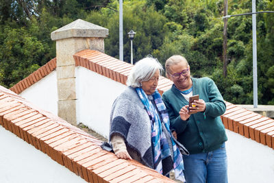 Group of women travelling. famous historic bridge of boyaca in colombia. colombian independence .