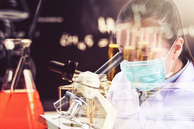 Female doctor working in laboratory