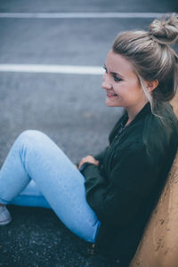 Close-up portrait of a smiling young woman