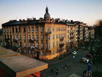 High angle view of buildings in city against clear sky