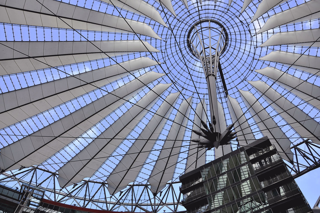 LOW ANGLE VIEW OF BLUE UMBRELLA AGAINST SKY