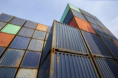 Row of stacking containers of freight import/export and shipping logistics transport industrial.