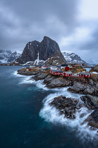 Scenic view of sea against sky during winter