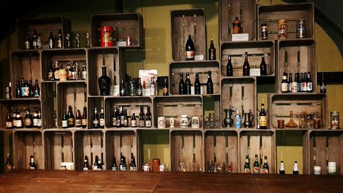 View of bottles in shelf