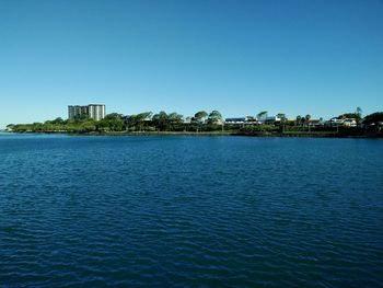 Scenic view of calm sea against clear sky