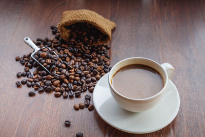 High angle view of coffee cup on table