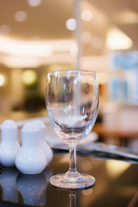 Close-up of wine glass on table in restaurant