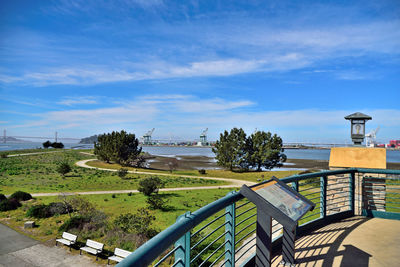 Scenic view of landscape against blue sky