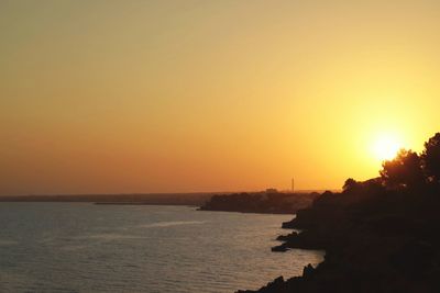 Scenic view of sunset over sea