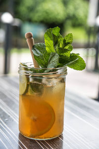 Close-up of drink in jar on table