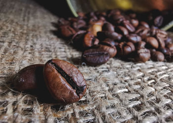 Close-up of coffee beans on table