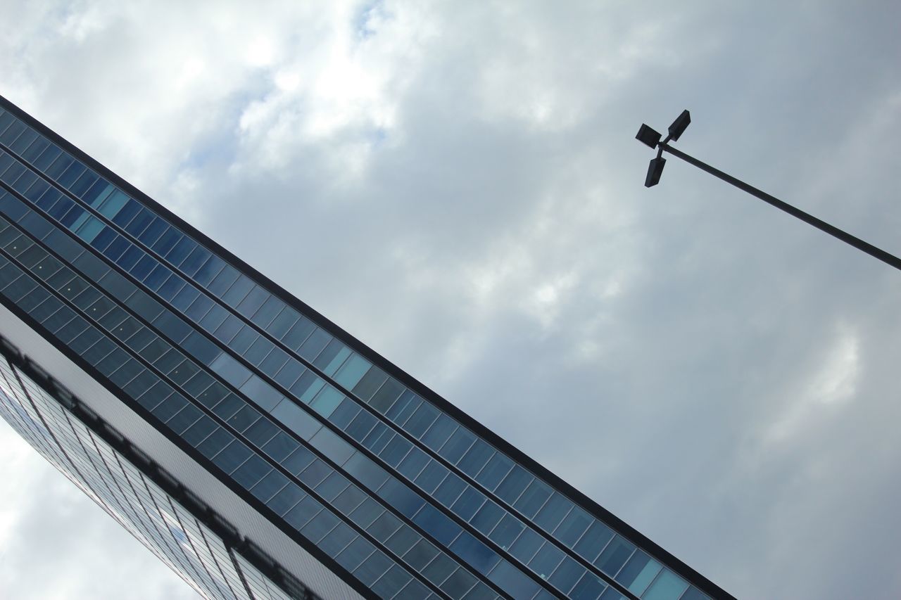 LOW ANGLE VIEW OF POWER LINES AGAINST CLOUDY SKY