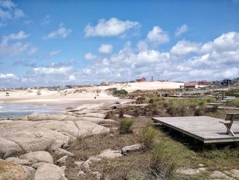 Scenic view of beach against sky