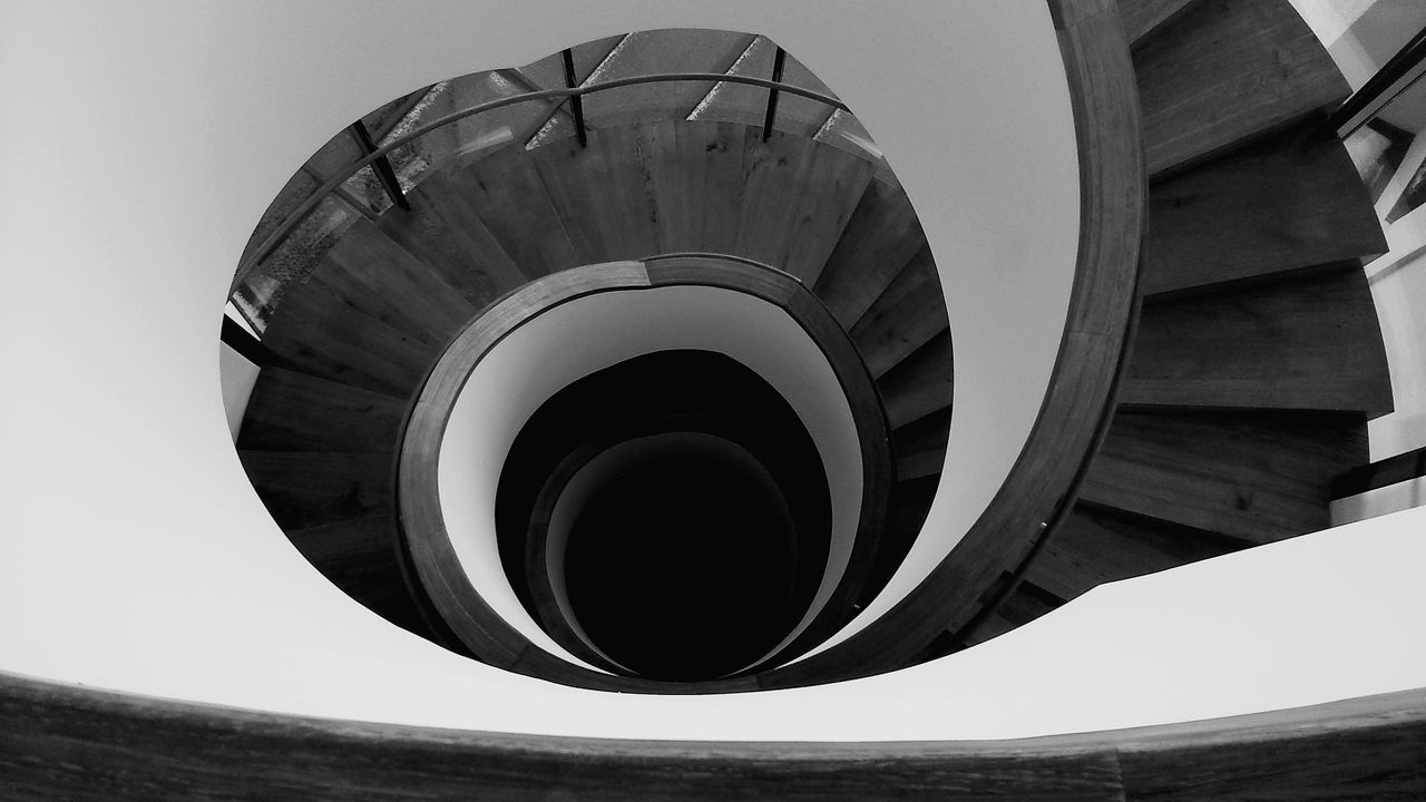 LOW ANGLE VIEW OF SPIRAL STAIRCASE