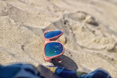 Low section of person on sand