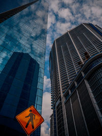 Low angle view of skyscrapers against sky