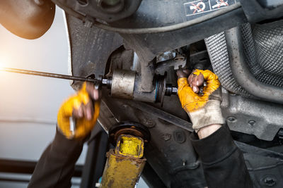 Cropped image of man working in factory