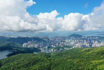 Panoramic view of city and buildings against sky