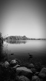View of lake against clear sky