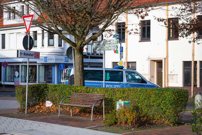 Empty street amidst buildings in town