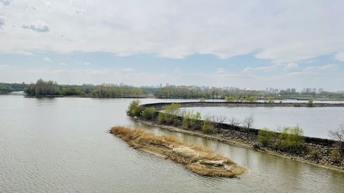 Scenic view of river against sky