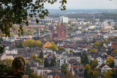 Aerial view of townscape against sky
