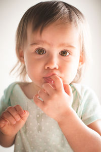 Close-up portrait of cute baby girl