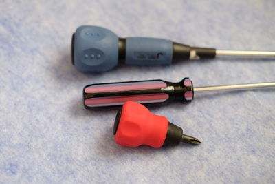 High angle view of screwdrivers on table