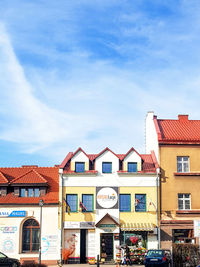 Houses against sky in city