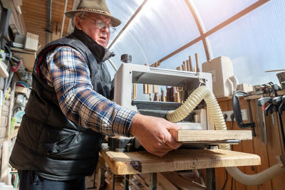 Carpenter working at workshop