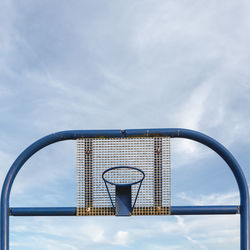 Low angle view of basketball hoop against sky