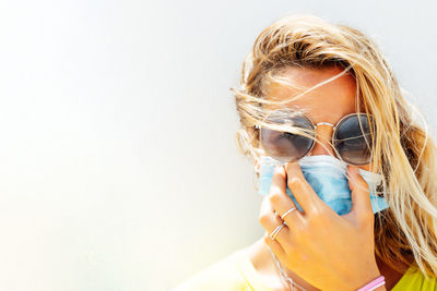 Woman with protection mask in the street