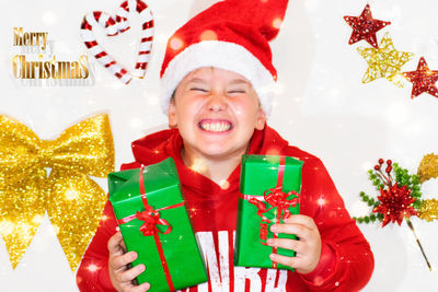 Portrait of happy boy wearing hat