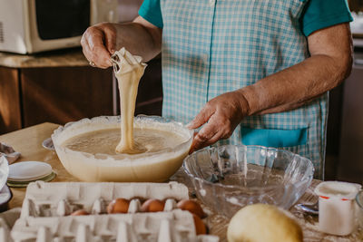 Woman making traditional pastries at home, christmas desserts and pastries