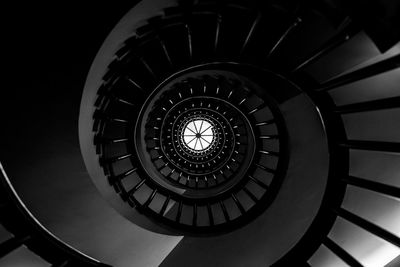 Low angle view of spiral staircase in building