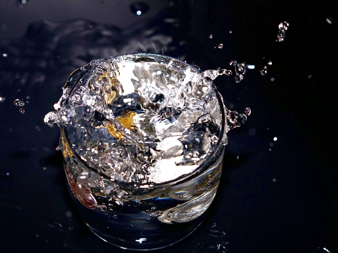 water, drop, close-up, indoors, purity, transparent, splashing, reflection, glass - material, bubble, ice, motion, focus on foreground, high angle view, no people, freshness, wet, studio shot, crystal, waterfront