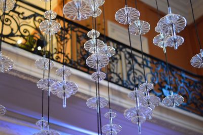 Low angle view of pendant lights hanging from ceiling