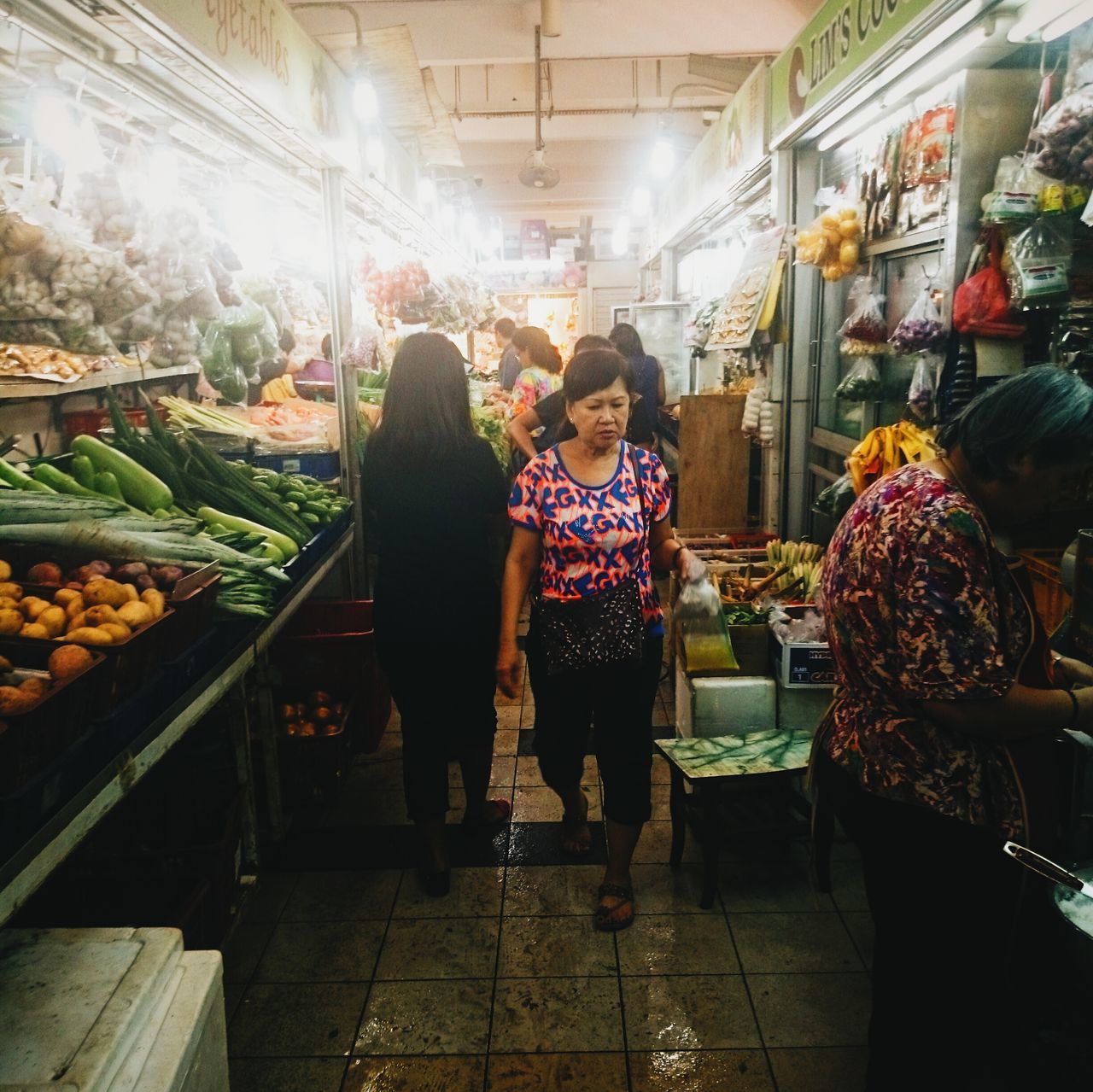 indoors, retail, for sale, food and drink, market stall, lifestyles, market, store, men, shop, large group of objects, choice, casual clothing, food, shopping, person, abundance, variation