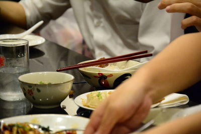 Midsection of person preparing food