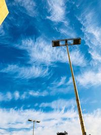 Low angle view of street light against sky